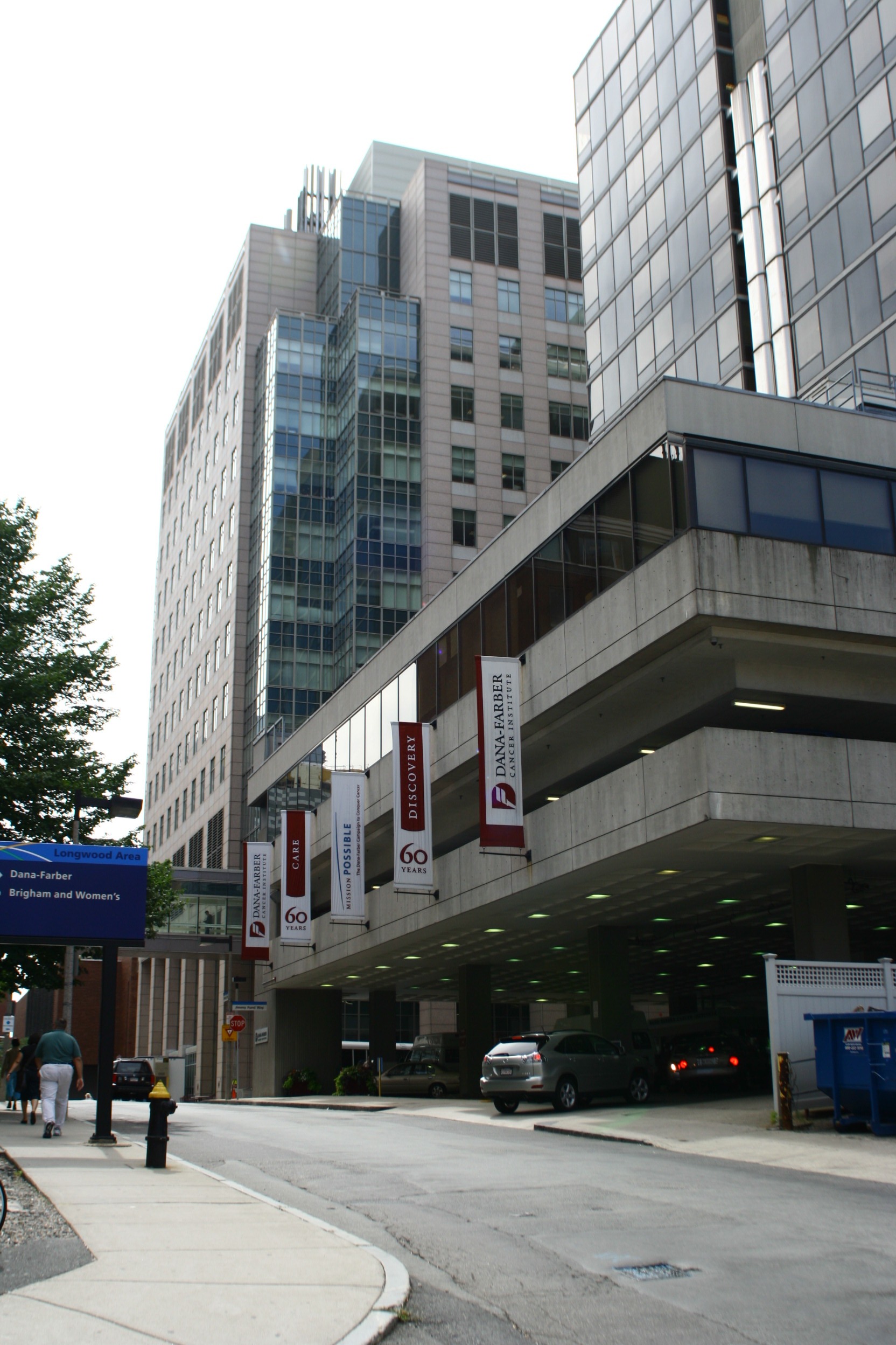 Glass-and-concrete Dana-Farber Cancer Institute buildings along a Longwood street
